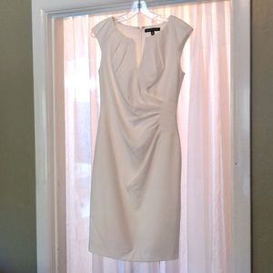 Like new Saks Fifth Avenue cream sheath dress with gathered waist detail. Size 2
